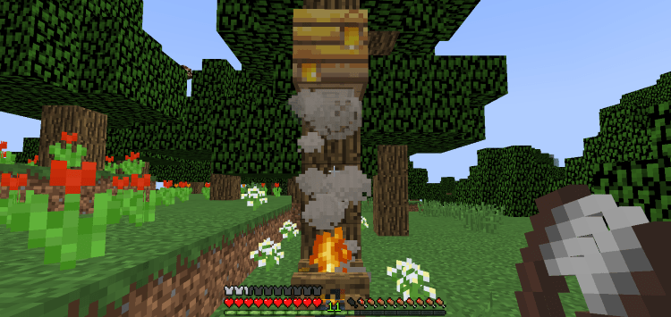 How to Tame a Bee in Minecraft, campfire under bee's nest