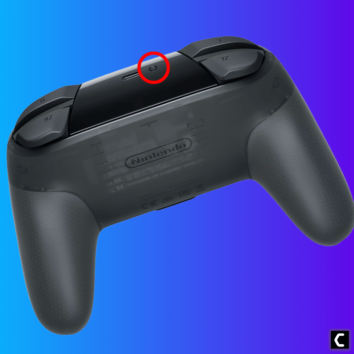 Nintendo pro controller pairing button highlighted with red circle marker