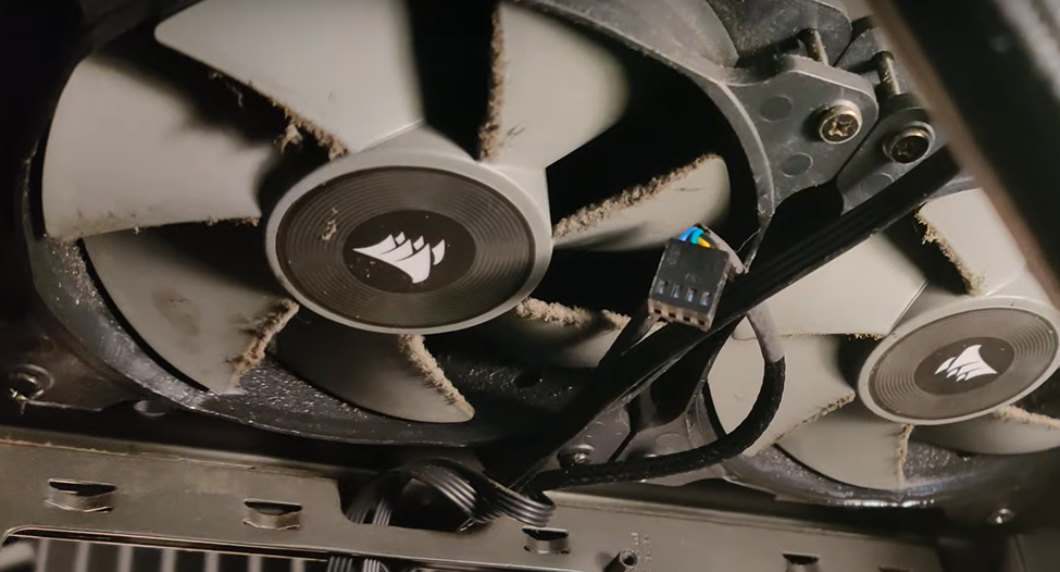 Exhaust Fans in a Gaming PC Covered in Dust due to Vaping
