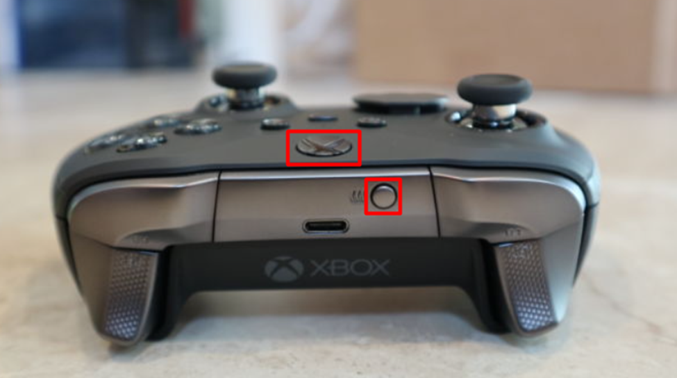 Pressing buttons to pair Xbox controller with ROG Ally
